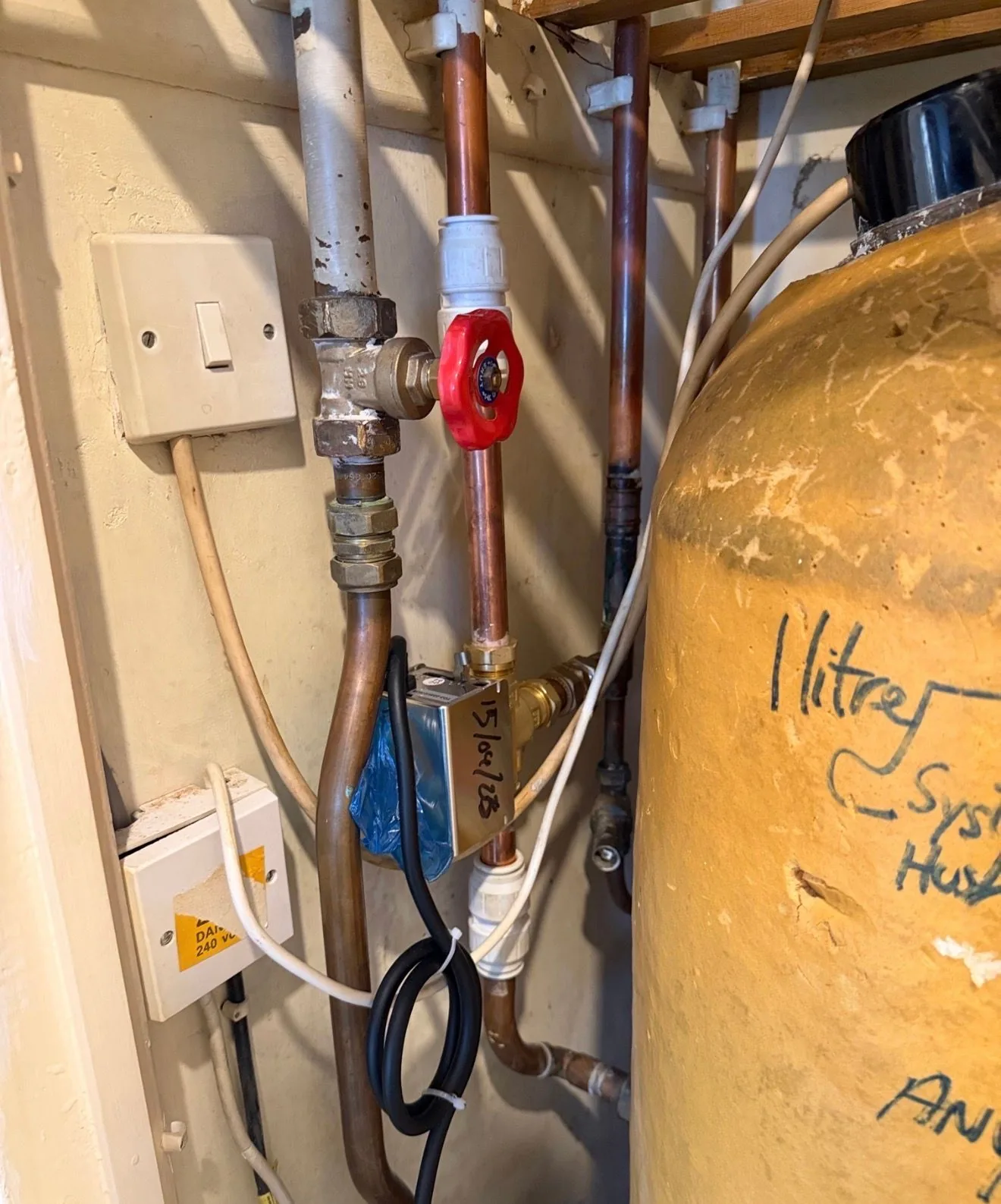 A valve on the cylinder pipework used to dose treatment into a central heating system.